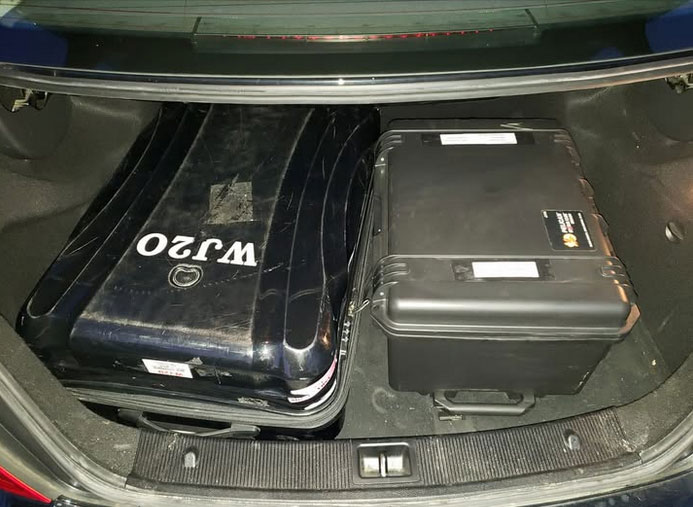 One full KW contest station fits in two bags weighting 49.99999 lbs each. With a week's worth of clothes used for packing.